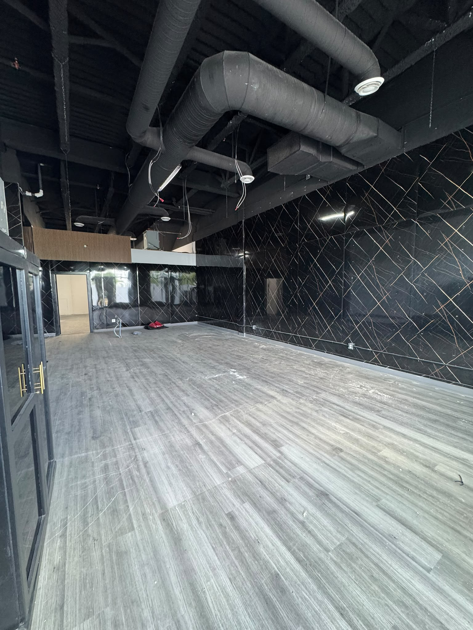 Feature wall and exposed mechanical